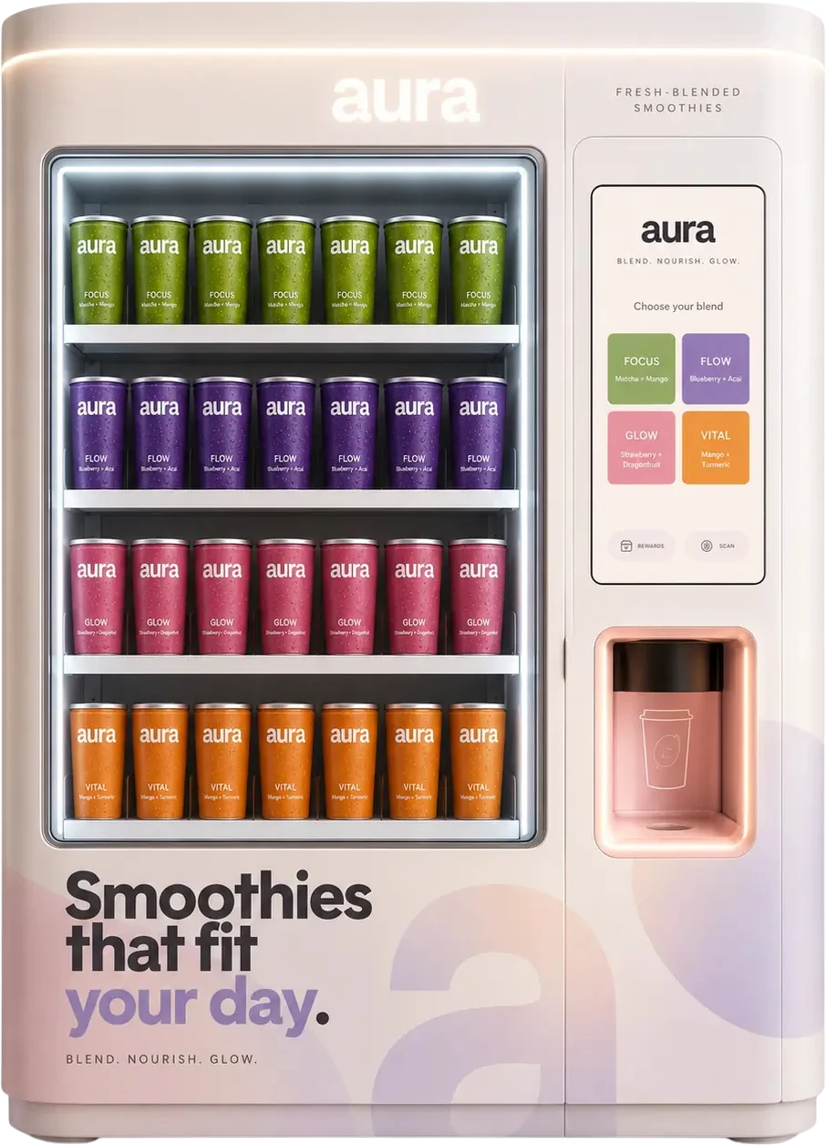 The aura fresh-blended smoothie vending machine — Focus, Flow, Glow and Vital cups on lit shelves with a touchscreen to choose your blend.